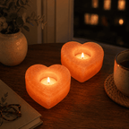 Heart-Cut Salt Tealight Holders, Set of 2 – styled in a home lifestyle setting, lit at evening
