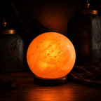 Sphere-Cut Salt Lamp, 4kg – studio photo lit against a dark background