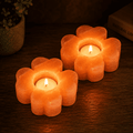 Flower-Cut Salt Tealight Holders, Set of 2 – studio photo lit against a dark background