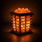 Woven Cane Basket Salt Lamp – studio photo lit against a dark background
