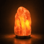 Himalayan Rock Salt Lamp, 4-6kg – studio photo lit against a dark background
