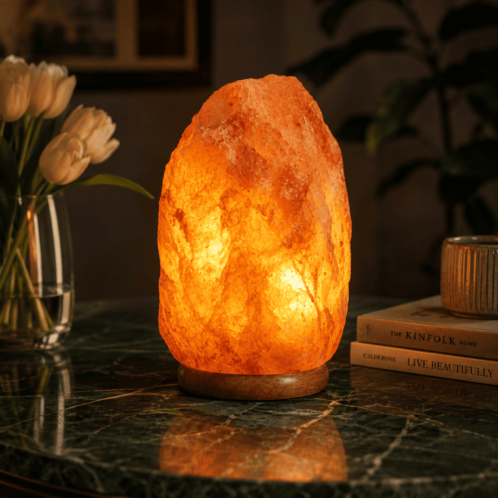 Himalayan Rock Salt Lamp, 9-12kg – styled in a home lifestyle setting, lit at evening