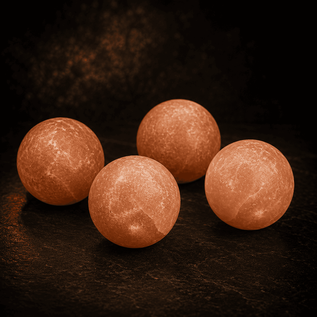Salt Massage Ball Set, Pack of 4 – studio photo lit against a dark background
