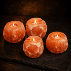 Pink Salt Tealight Holders, Set of 4 – studio photo lit against a dark background